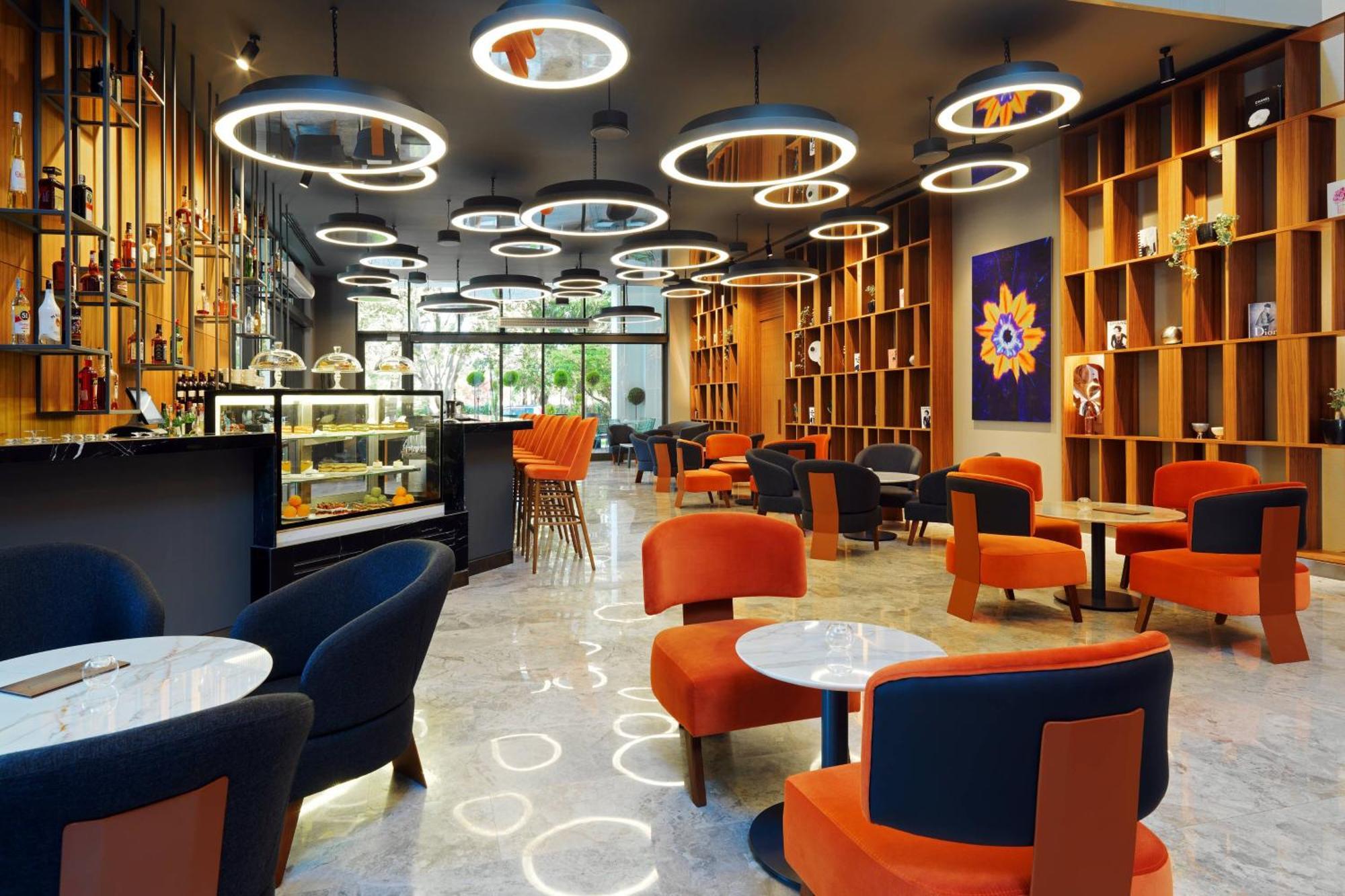 Sheraton Batumi Hotel Eksteriør bilde The interior of a Starbucks Reserve store in Shanghai, China
